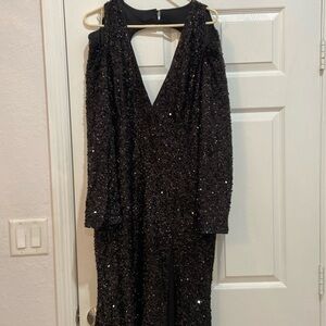 Black Sequin dress. Cold shoulder, semi long train, leg slit.